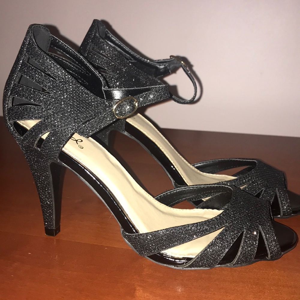 Black shimmer, ankle strap heel. New, in box
